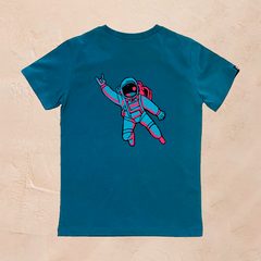 Camiseta azul 100% algodón con astronauta en la parte trasera, diseño Laudaperezblaya.