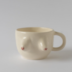 taza tipo café con pechos