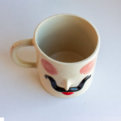 fotografia taza ceramica dali vista desde arriba