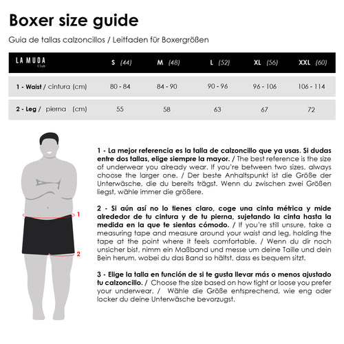 Guía visual de tallas para calzoncillos de La Muda Club mostrando a un hombre con calzoncillos verdes estampados. Incluye medidas específicas como circunferencia de cintura y largo de pierna con instrucciones sobre cómo medir para elegir la talla adecuada.