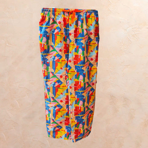 Pantalón de pijama largo con estampado geométrico colorido diseñado por Mireia Ruiz, fabricado en algodón español en Villaconejos.